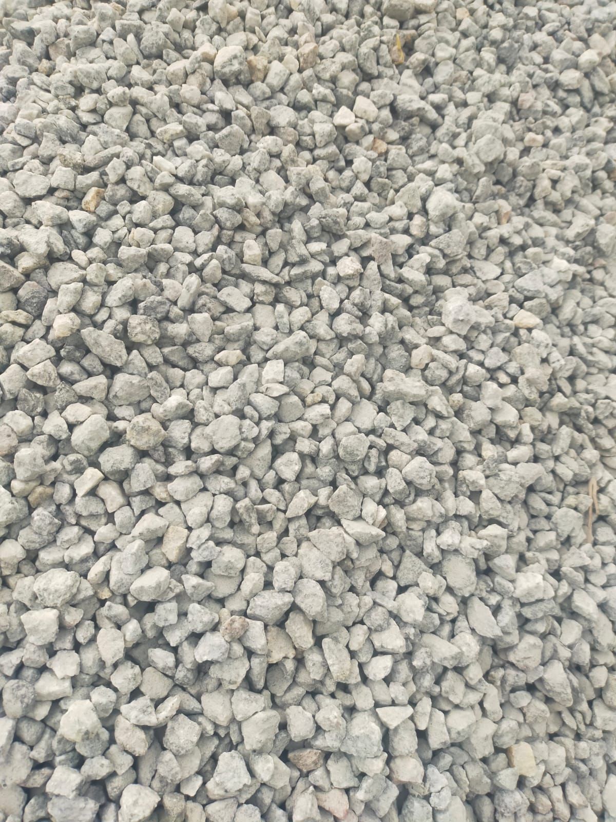 Crushed stone aggregate, roughly 20 mm grade