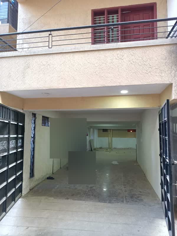 Entrance and stilt parking
