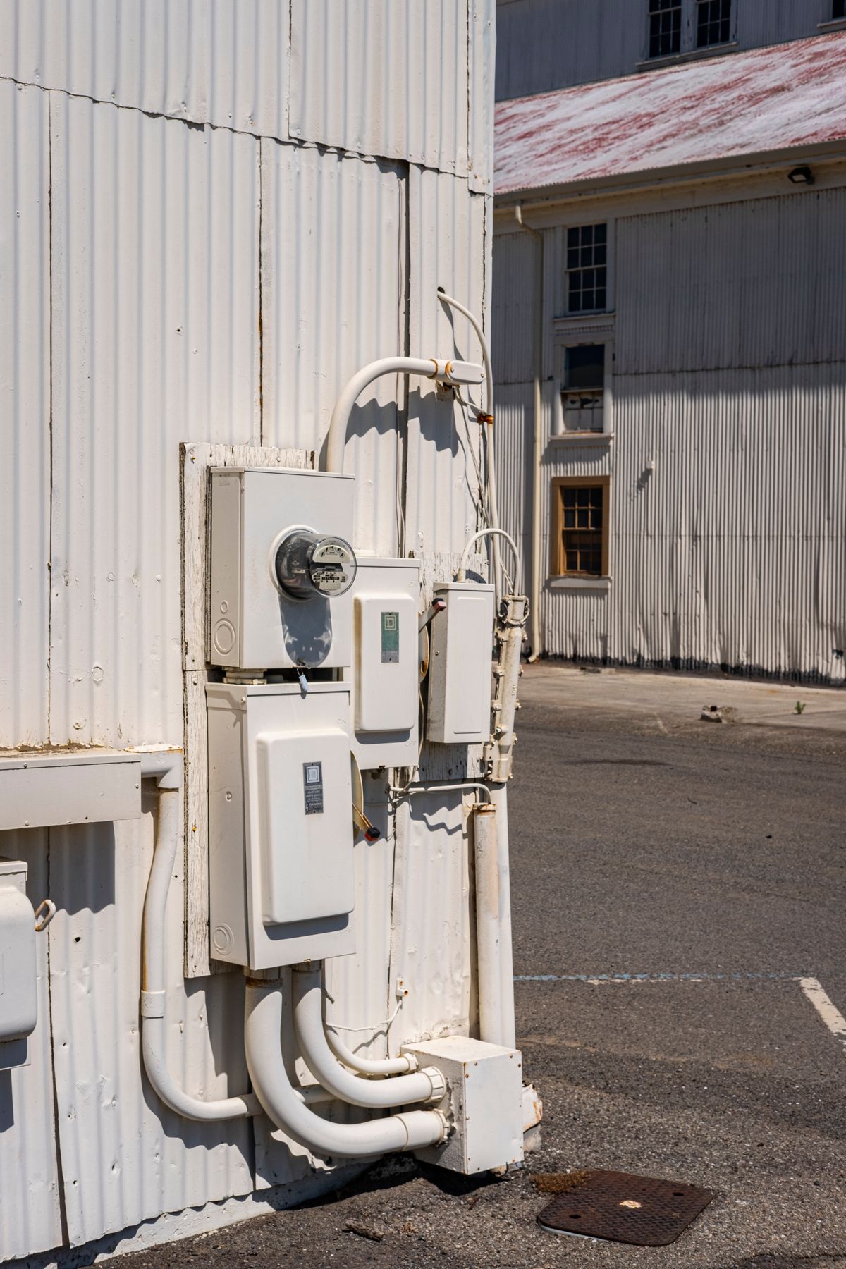 Electricity meter and distribution panel mounted on a wall