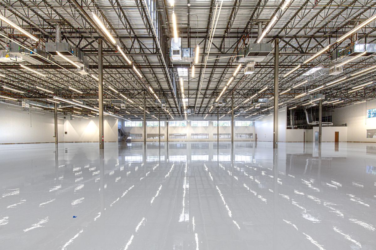 Glossy epoxy flooring in an industrial interior