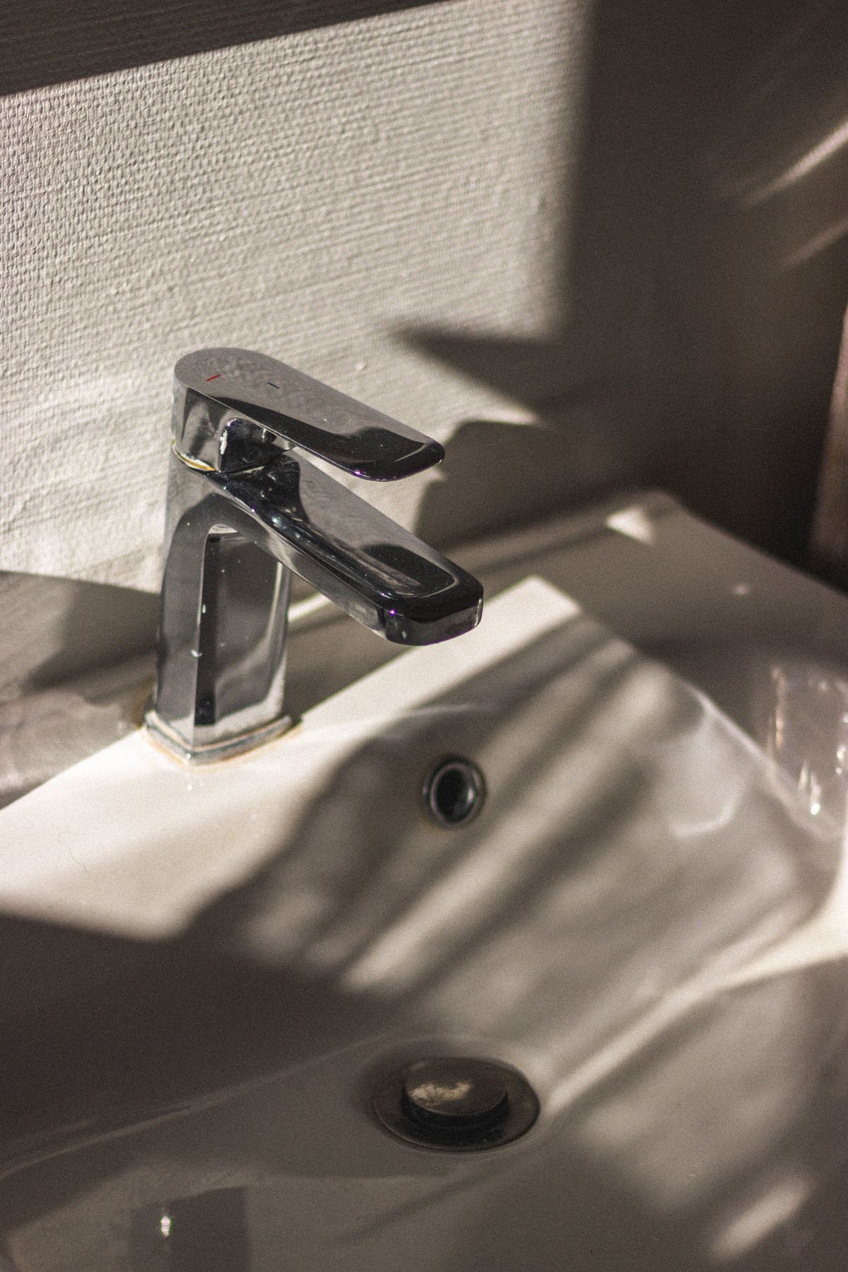 Stainless steel faucet fixture installed on a sink